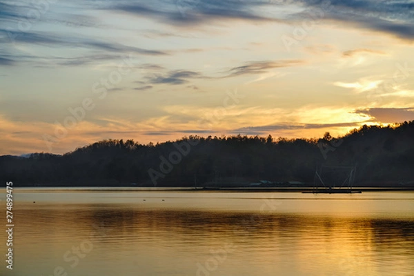 Fototapeta Wide-angle lake in the morning, sunrise after the mountain