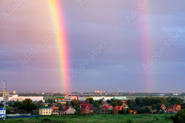 Fototapeta beautiful bright rainbow over the city