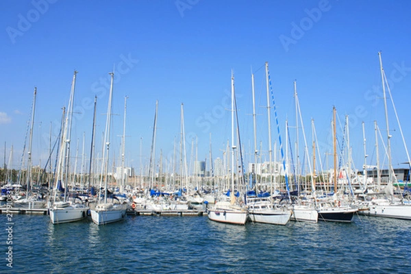 Fototapeta Yachts at Port Vell in Barcelona.