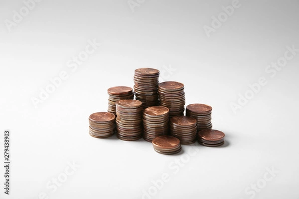 Fototapeta Many stacks of American coins on white background