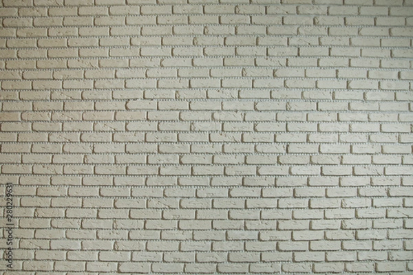 Fototapeta Texture background concept: white brick wall background in rural room . White brick wall background in rural room.