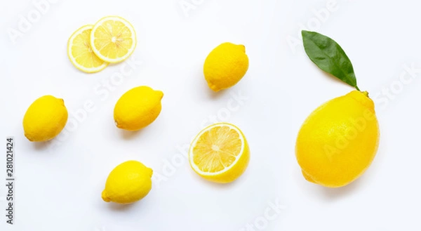 Obraz Lemon and slices with leaves isolated on white