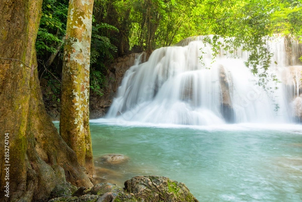 Fototapeta Breathtaking green waterfall at deep forest, Erawan waterfall located Kanchanaburi Province, Thailand