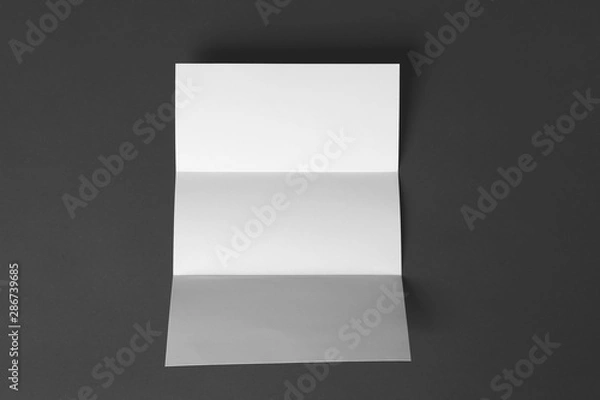 Obraz Blank brochure on dark grey background, top view. Mock up for design