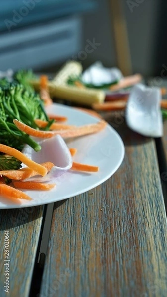 Fototapeta fresh salad at plate with wooden background