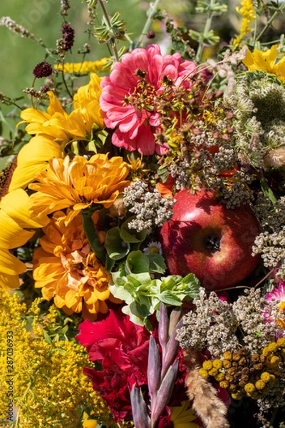 Fototapeta Floristic bouquet of flowers, herbs and fruits that are the symbol of summer