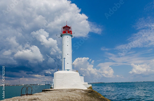 Fototapeta Seascape with lighthouse on the Black Sea in Odesa during the summer season