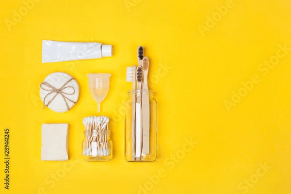 Fototapeta Set of eco-friendly plastic-free body care items on the yellow background. Copy space. Zero waste concept, plastic-free, organic, eco-friendly shopping