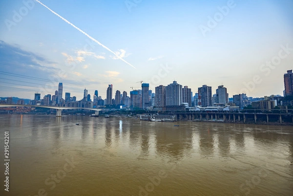 Fototapeta River-Crossing Bridges and High-rise Buildings in the Evening of Chongqing, Asia