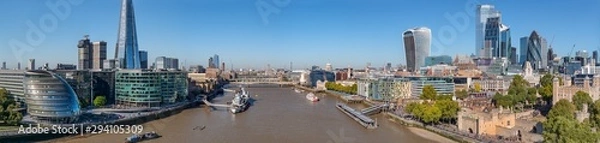 Obraz Aerial cityscape panorama of the Thames river on a sunny day with the City Hall, Shard skyscraper and London City Financial district skyline.  