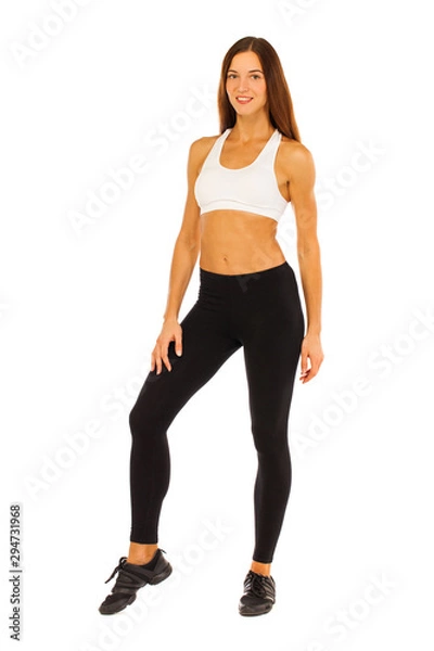 Obraz Sexy fitness woman posing in studio - isolated on a white background