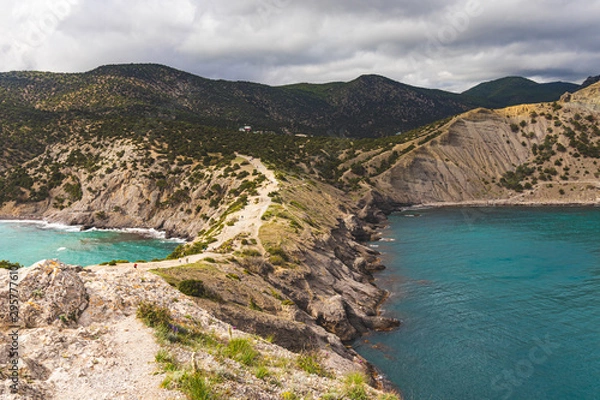 Fototapeta View from the cape to the hills and forests