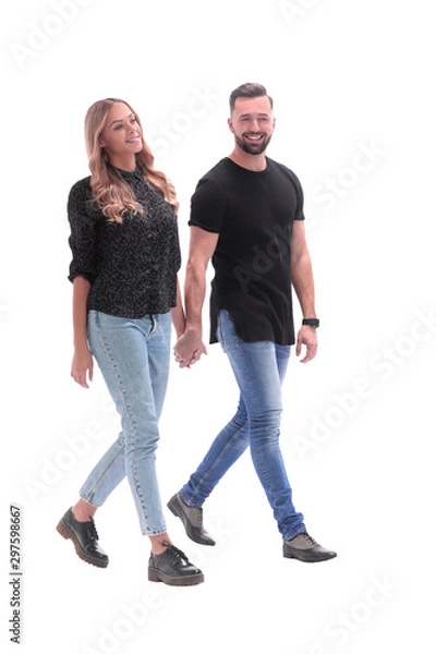 Fototapeta in full growth. young couple walking together