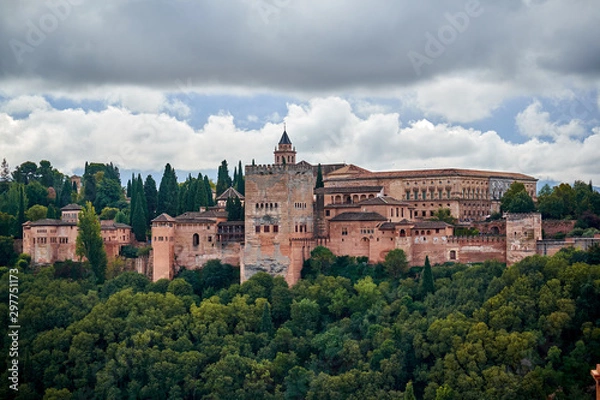 Fototapeta Alhambra Palace in Granada , Spain Full view at sun set time. Sierra Nevada is the backgorund. Albaicin is in front of this monument.