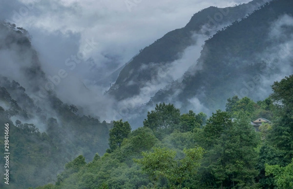 Fototapeta hills in the clouds in the early morning