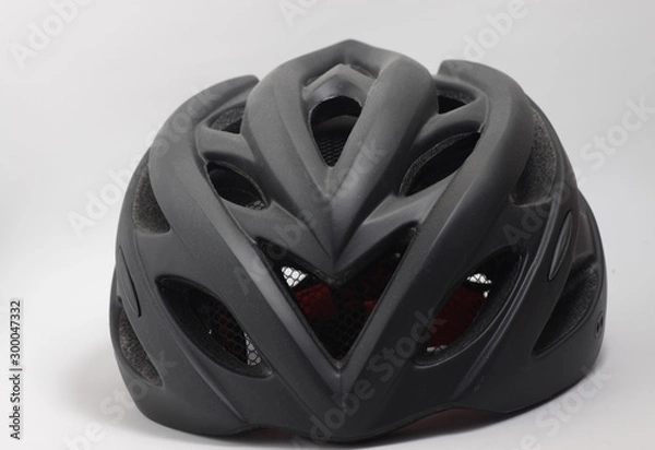 Fototapeta Black bicycle helmet