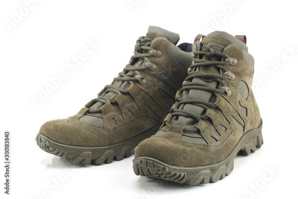 Fototapeta Hiking boots isolated on white