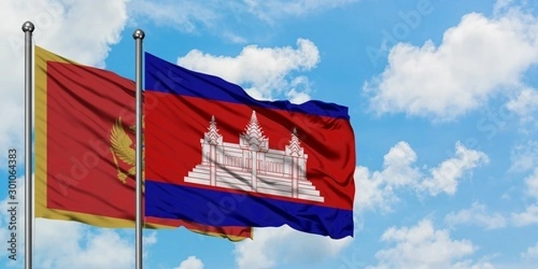 Fototapeta Montenegro and Cambodia flag waving in the wind against white cloudy blue sky together. Diplomacy concept, international relations.