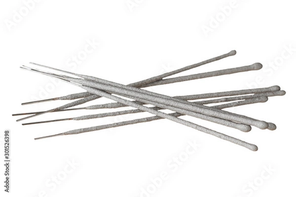 Fototapeta Strewn many gray sparklers, bengal lights on aluminum stick isolated on white background without shadow. Top view