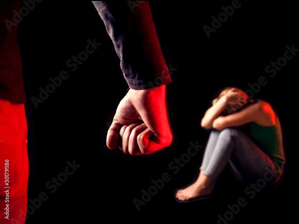 Fototapeta Man shows fist in front of woman. People, family violence and crime concept