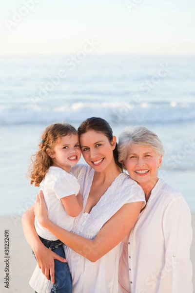 Fototapeta Family at the beach