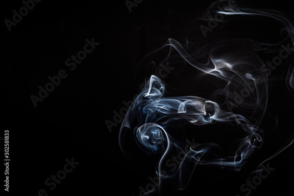 Fototapeta Abstract smoke swirls on black