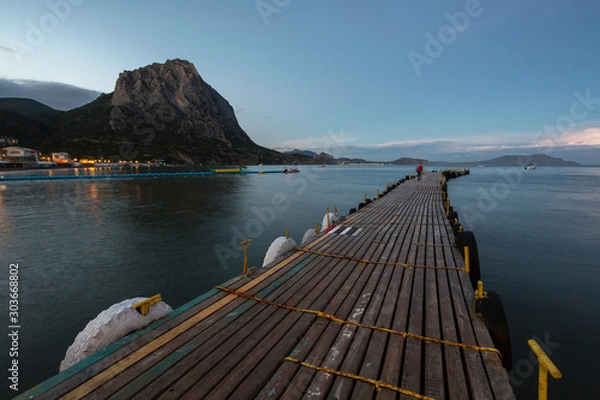 Fototapeta mooring in the bay, floating pier, a long pier