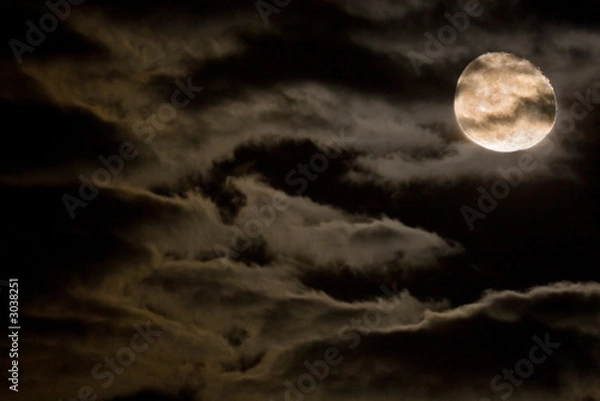 Fototapeta full moon at stormy sky