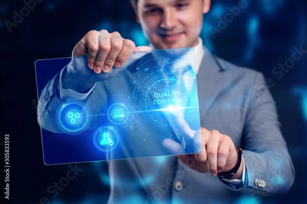 Fototapeta Business, technology, internet and networking concept. Young businessman working on his laptop select the icon Quality control on the virtual display.