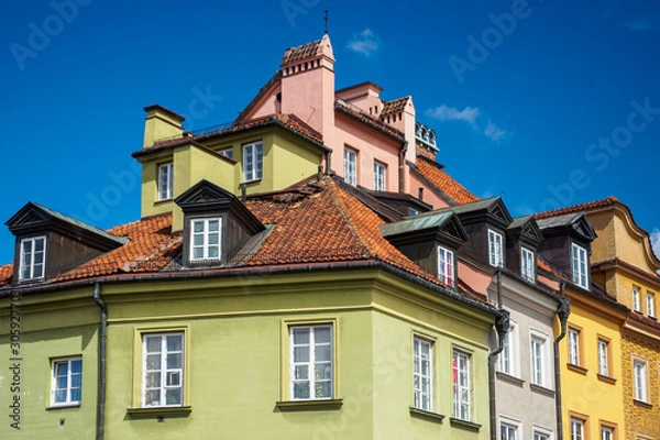 Fototapeta Roofs and walls of medieval houses of the old city in Warsaw, Poland