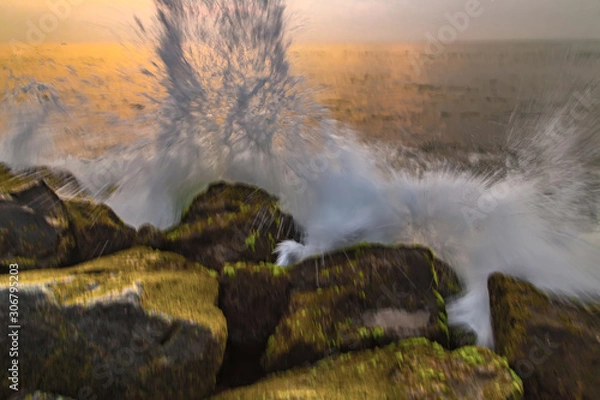 Fototapeta storm waves are breaking about the breakwater