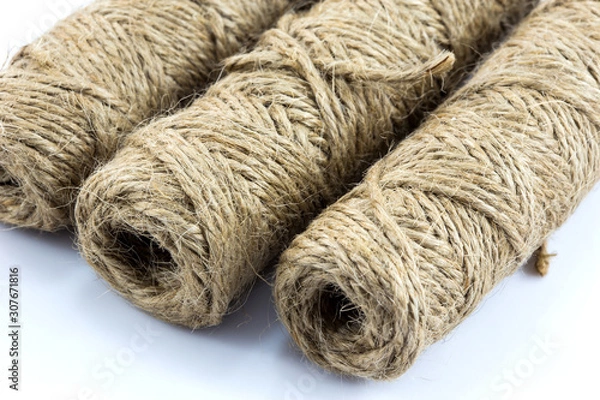 Fototapeta Bundle of hemp rope or manila rope isolated on white background.