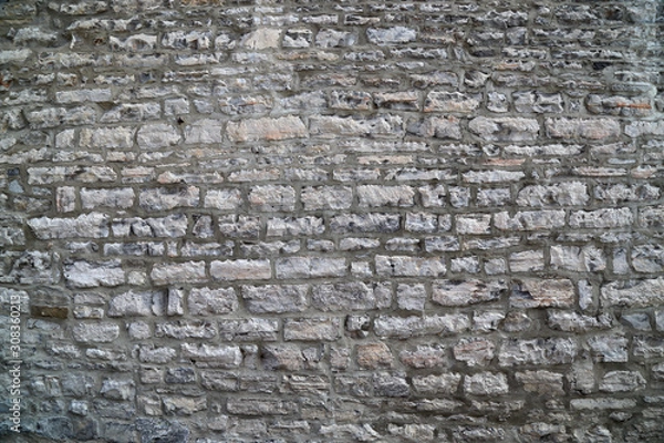 Fototapeta Texture of a stone wall.