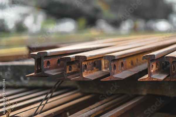 Fototapeta Close up rusty rails for railway construction,stack of metal rusty