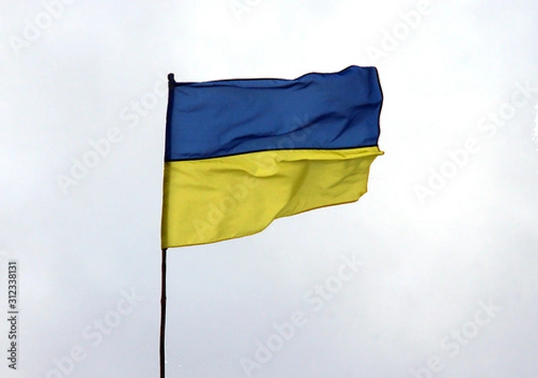 Fototapeta Ukraine flag on sky background