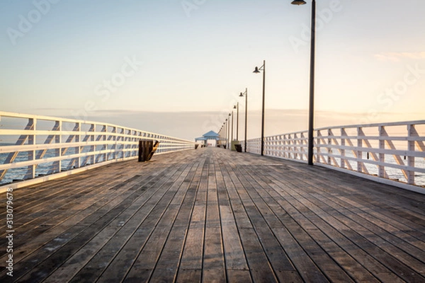 Fototapeta wooden pier at sunset 