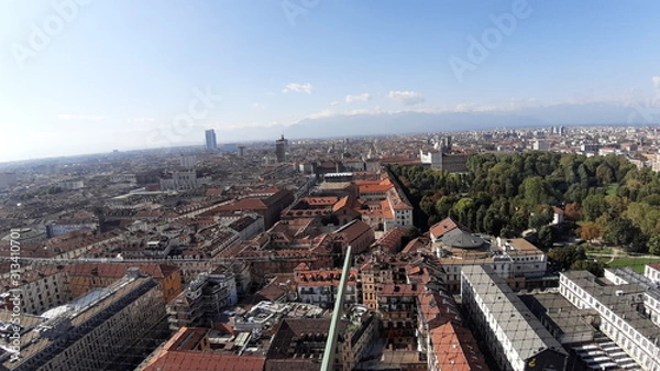 Obraz Turin, Italy - 01/004/2019: Beautiful panoramic view from Mole Antoneliana to the city of Turin in winter days with clear blue sky and the alps in the background. 