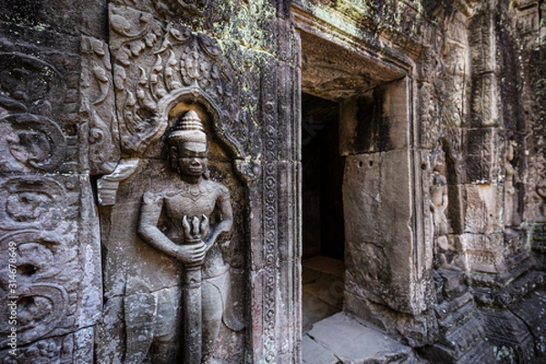 Fototapeta Sculpture of Hindu gods in temple of Ta Som, Angkor Wat, Cambodia