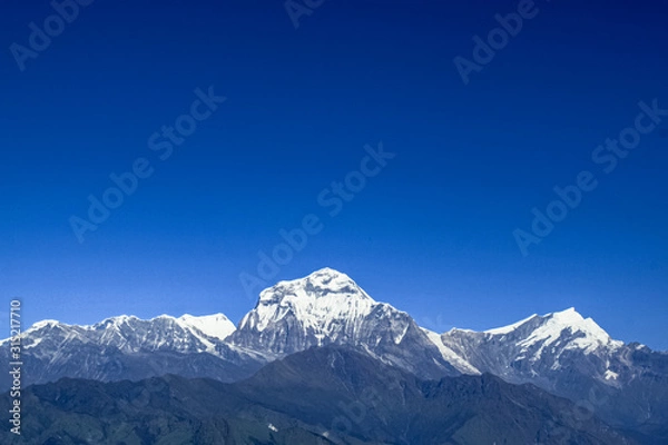 Obraz Beautiful and Amazing Snow-covered Mountain With Blue Sky