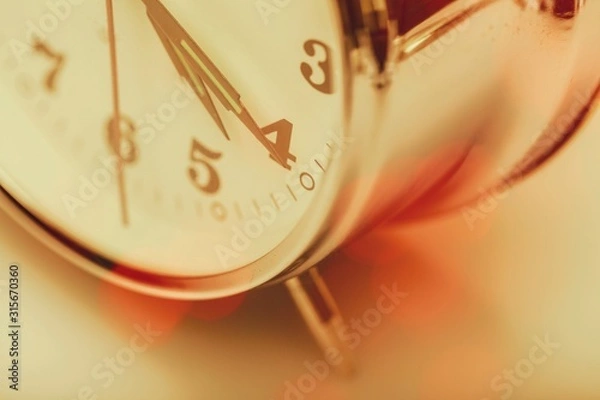 Fototapeta Photo of retro vintage clock on the background