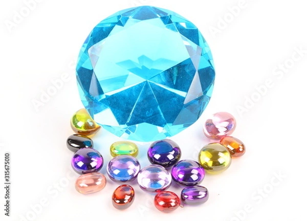 Fototapeta Blue diamond and beautiful gems on white background 