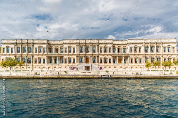 Fototapeta  Tourist ship sails on the Golden Horn, Istanbul, Turkey. Scenic sunny panorama of Istanbul city in summer. Beautiful waterfront of Istanbul at sunset. Concept of traveling and vacation in Istanbul.