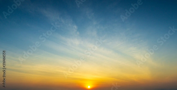 Fototapeta the sun and sky with clouds golden hour time nature background