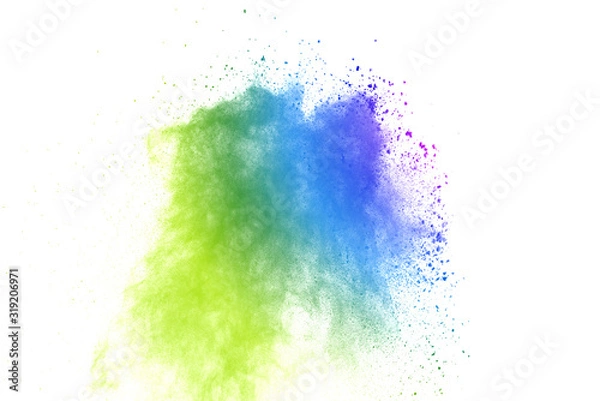 Fototapeta Freeze motion of colorful color powder exploding on white background.  Paint Holi.