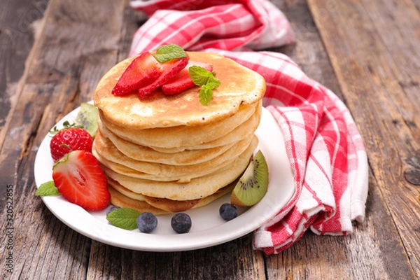 Fototapeta stack of pancakes with berry fruit