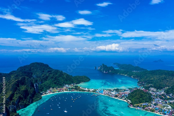 Fototapeta Beautiful panoramic view over Tonsai and Dalum Beach. Green jungles and hot stones on the bright sun of tropical island and the mountains in Andaman Sea. Phi Phi Viewpoint, Krabi, Thailand