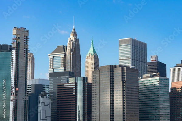 Obraz Lower Manhattan New York City Skyline Scene with Modern Skyscrapers on a Clear Blue Day