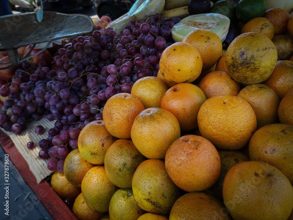 Fototapeta Naturally grown fruits and vegetables sold in a street market