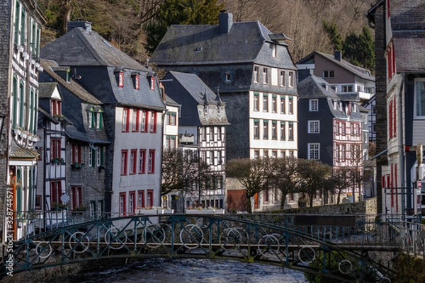 Fototapeta Half-timbered houses along the rur river in Monschau,