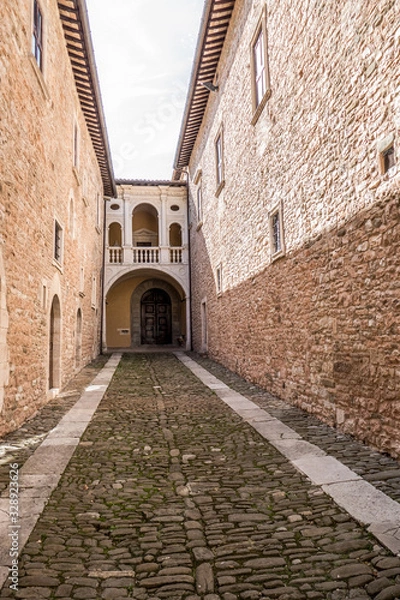 Fototapeta Historical center of Piobbico with ancient stone  houses and ancient church